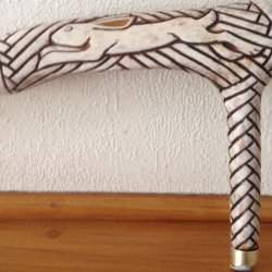 Carved/ scrimshawed antler art piece